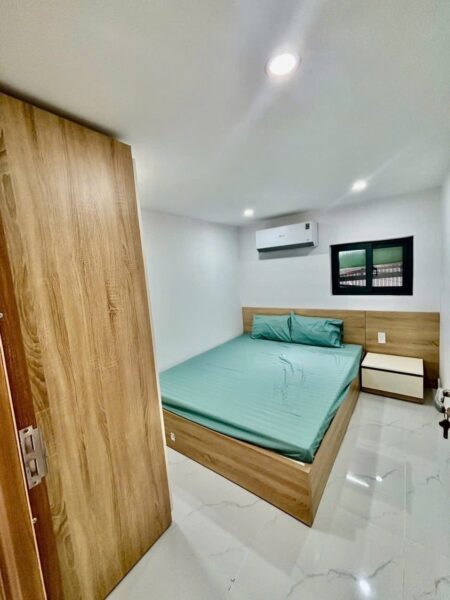Nhà mê lửng mặt tiền Trần Quang Long 90mv, 5990